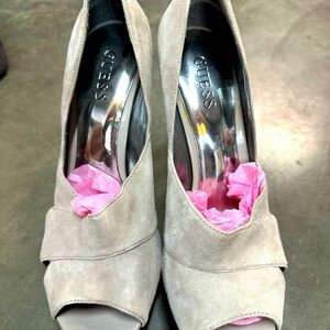 Guess heels . 9M they are tried on as you can see .Small scratch on one shoe.new